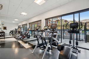 Gym with a paneled ceiling