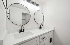 Bathroom featuring double vanity