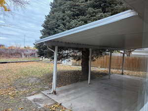 Fenced backyard featuring a patio