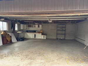 Garage featuring a garage door opener