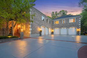 View of front of house featuring driveway and an attached garage