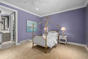 Bedroom with ornamental molding, carpet flooring, ceiling fan, and recessed lighting