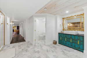 Hall featuring recessed lighting and wood ceiling