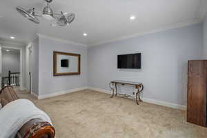 Unfurnished room featuring crown molding, light colored carpet, and recessed lighting