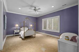 Bedroom with ornamental molding, ceiling fan, recessed lighting, and carpet