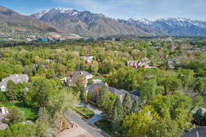 Aerial overview of property's location featuring a mountain backdrop