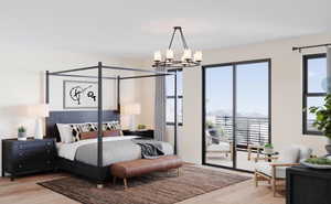 Primary bedroom featuring a spacious balcony, multiple windows, and beautiful LVP flooring.