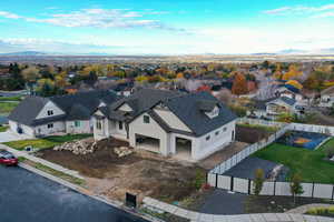 Aerial view of residential area with a mountainous background