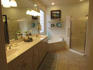 Primary Bathroom with garden tub and separate shower.