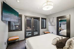 Bedroom featuring carpet floors, access to outside, and recessed lighting