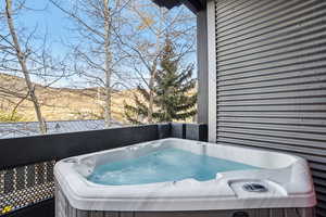 Deck featuring a hot tub