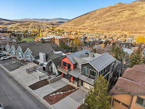 Aerial perspective of suburban area with mountains