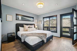 Bedroom featuring wood finished floors and recessed lighting