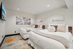 Bedroom featuring baseboards and recessed lighting