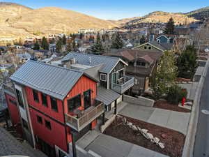Aerial view of residential area with mountains