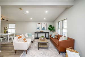Living room featuring healthy amount of natural light, recessed lighting, wood finished floors, and a ceiling fan