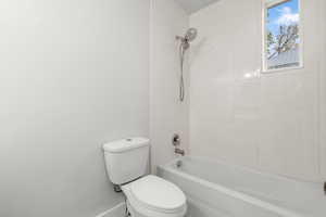 Bathroom with  shower combination and toilet