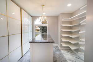 3rd Main Floor Bedroom built as a Walk in closet