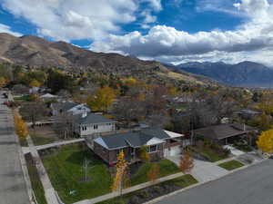 Aerial view of residential area with a mountainous background