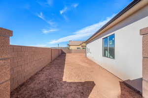 View of fenced backyard