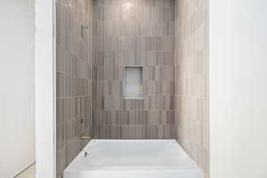 Bathroom featuring bathtub / shower combination