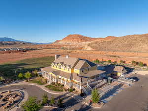 Overview of clubhouse featuring a mountainous background