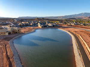 Aerial view of residential area featuring a water and mountain view