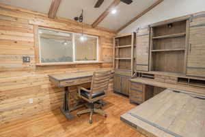 Office area with wooden walls, light wood-style floors, ceiling fan, and recessed lighting
