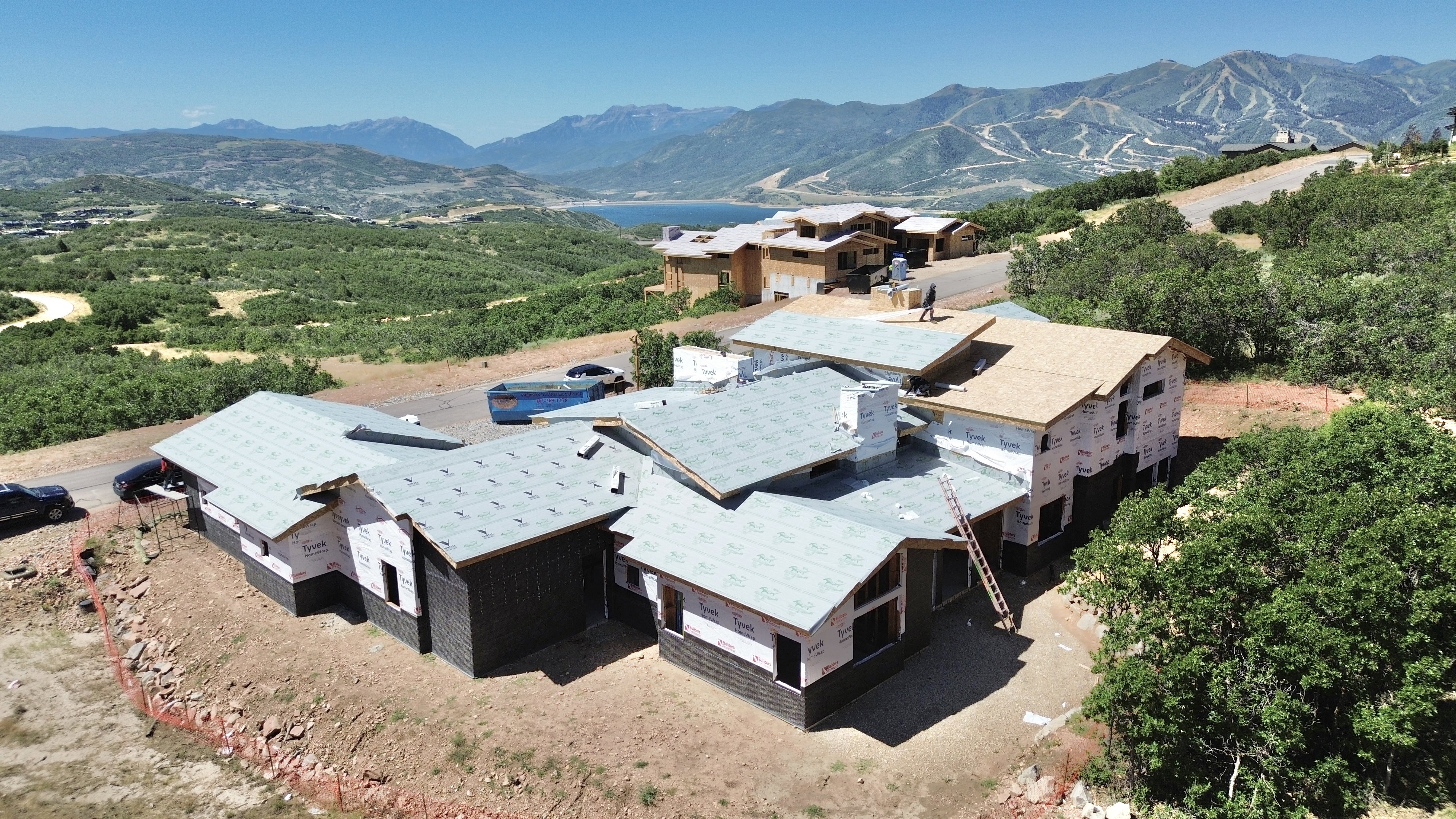 New construction property featuring a complex roofline and multiple gables
