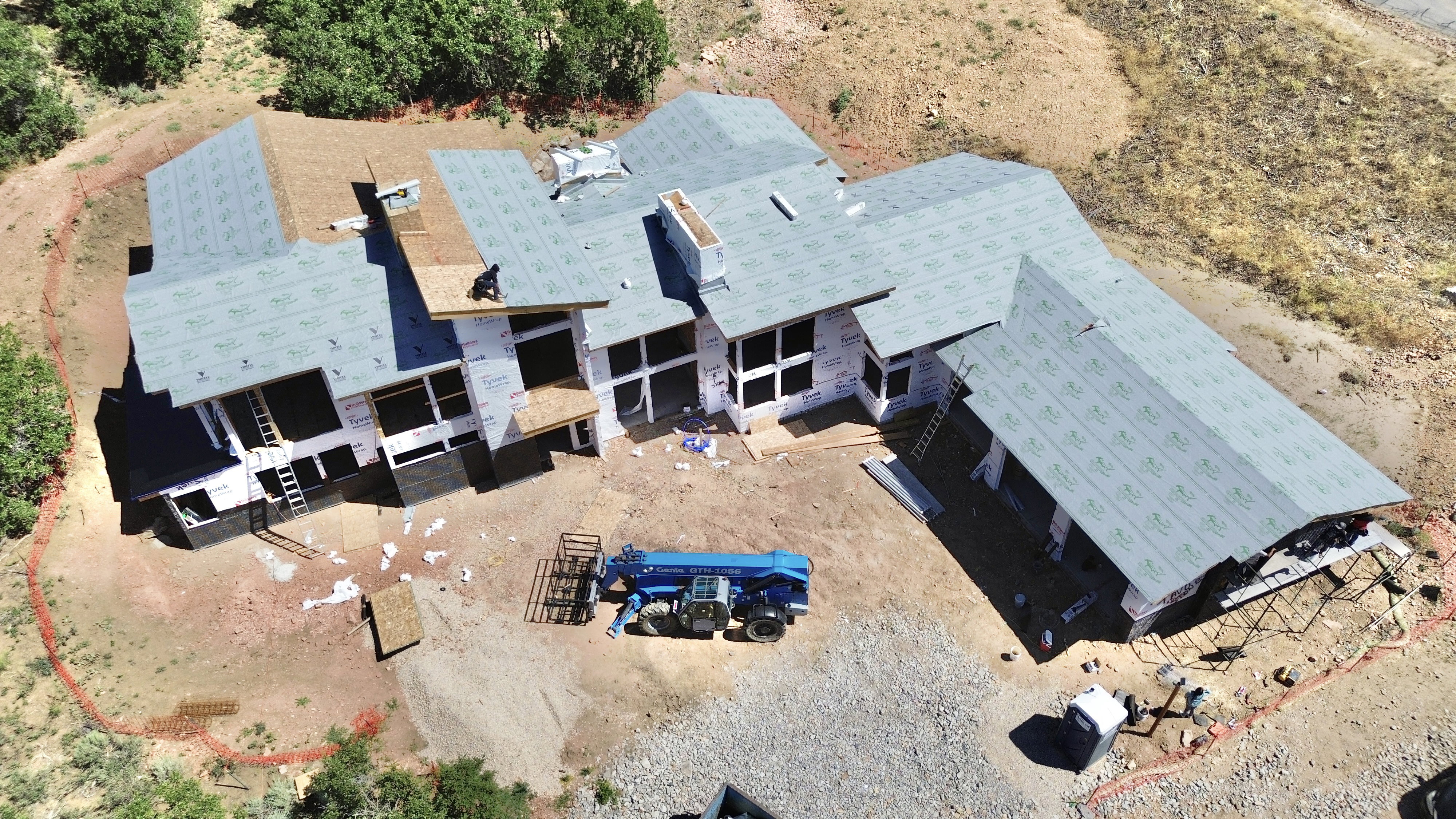 Contemporary architectural design featuring a multi-level roof structure with advanced underlayment