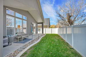 View of fenced backyard