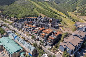 View of property location with a forest