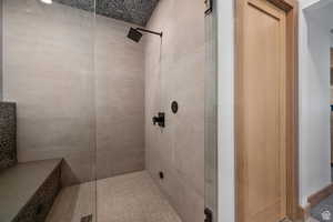 Full bath with tiled shower