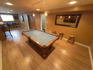 Playroom featuring pool table, light wood-style floors, and recessed lighting