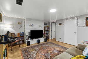 Living room featuring light wood-style flooring