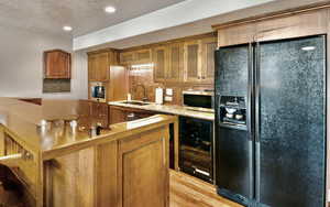 Basement Kitchen featuring full kitchen  appliances.