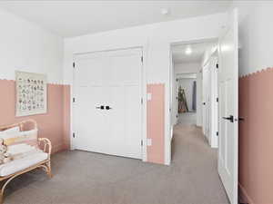 Living area with carpet floors