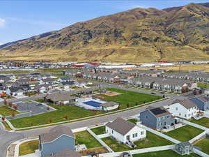 Aerial view of residential area with mountains