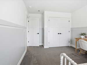 Office area featuring carpet and baseboards