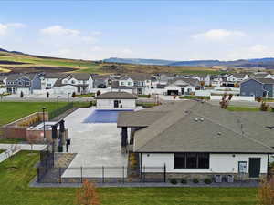 Aerial perspective of suburban area with mountains