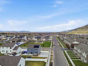 Aerial perspective of suburban area featuring mountains