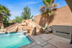 View of pool with a patio area