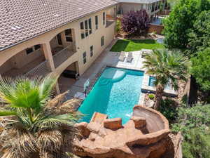 View of pool with a patio area