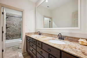 Bathroom with double vanity and  shower combination