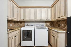 Washroom with independent washer and dryer and cabinet space