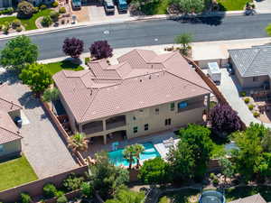 View of subject property featuring a pool area