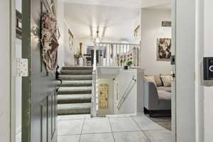 Staircase with tile patterned flooring
