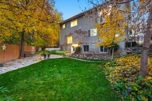 Back of house with a patio area