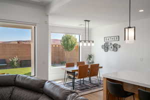 Dining space with light wood-type flooring