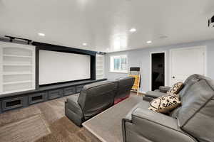 Carpeted cinema room featuring recessed lighting